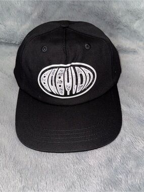 Black Babylon Baseball Cap with White Oval Graphic